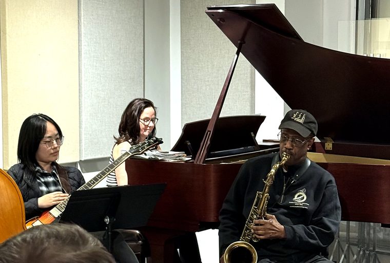 Patience Higgins playing with the group at NYMI's free community improvisation class