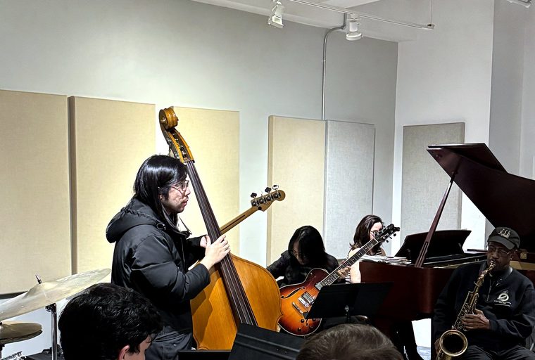 Musicians playing together at a New York Music Institute class